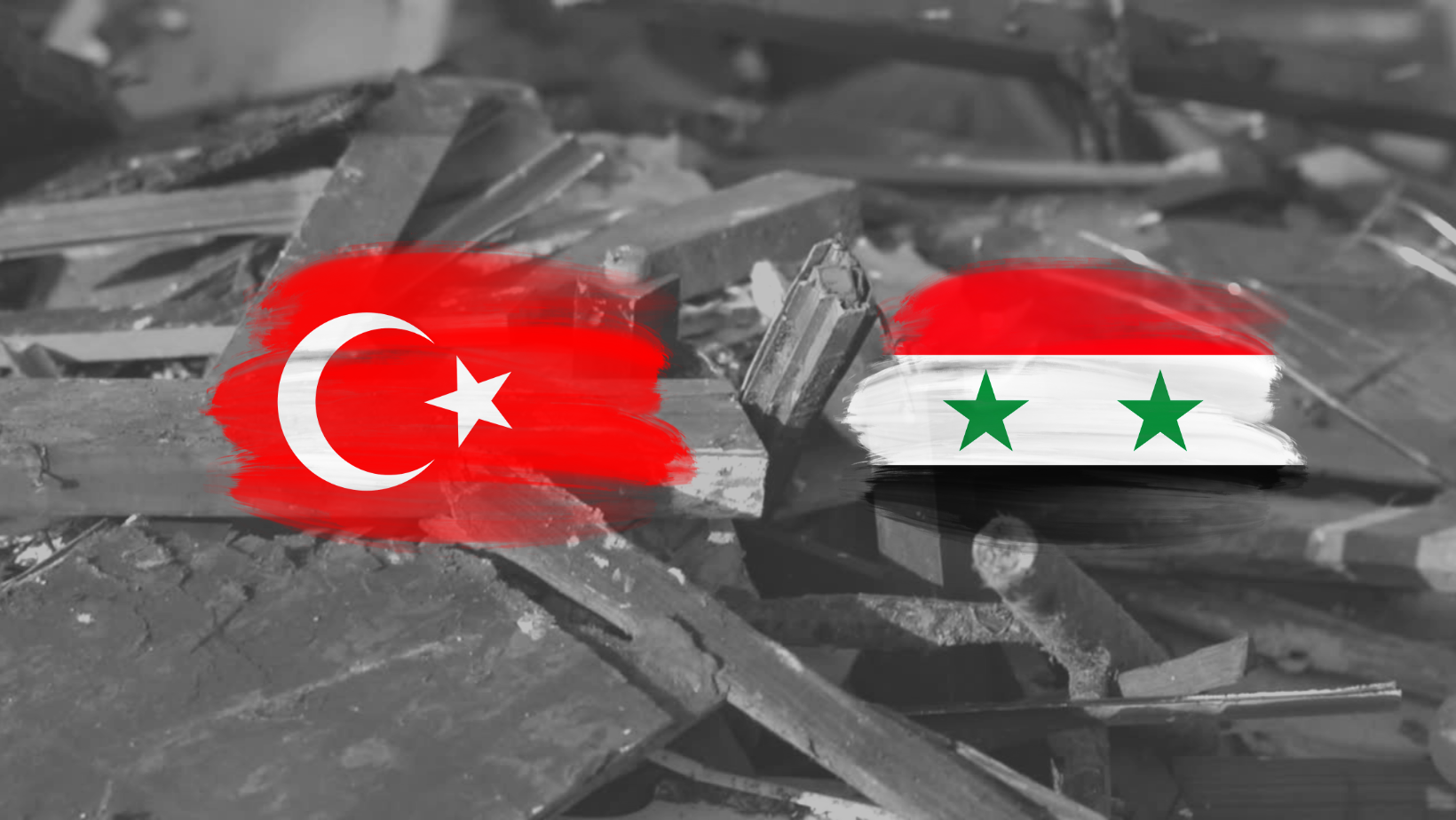 Die türkische und die syrische Flagge vor Trümmern.